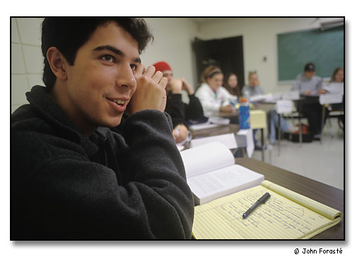 Students in humanities class discussing Islam and prophets. <br>Saint Anselm College, Manchester, New Hampshire. October 2002.