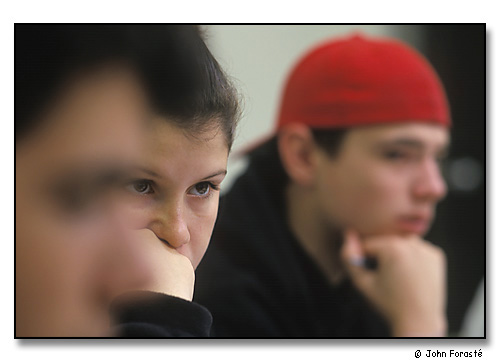 Students in humanities class discussing Islam and prophets. <br>Saint Anselm College, Manchester, New Hampshire. October 2002.
