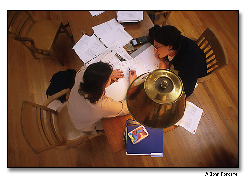 Two students working together on homework. Wesleyan University, Middletown, Connecticut. September 2000.