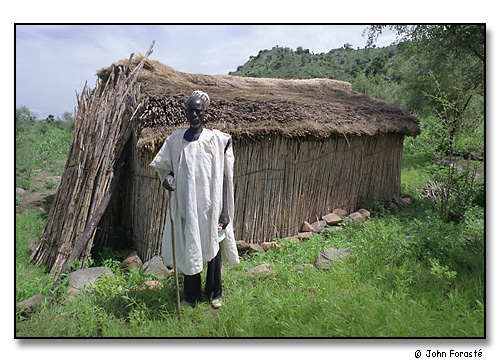 Village Chief outside mountain school, above Alex's village of Mora.