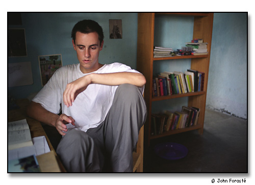 Alex at his desk, Cameroon, Africa