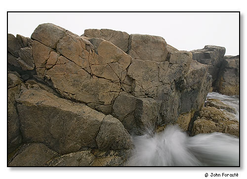 Surf on boulders. September 2007.