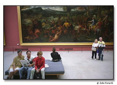 Looking. The Louvre, Paris, France. August 2002.