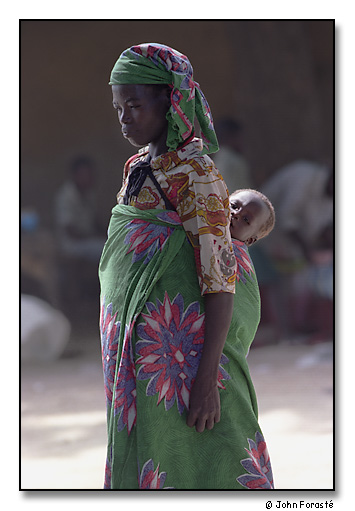 Woman and baby in market, Mora, Cameroon, Africa